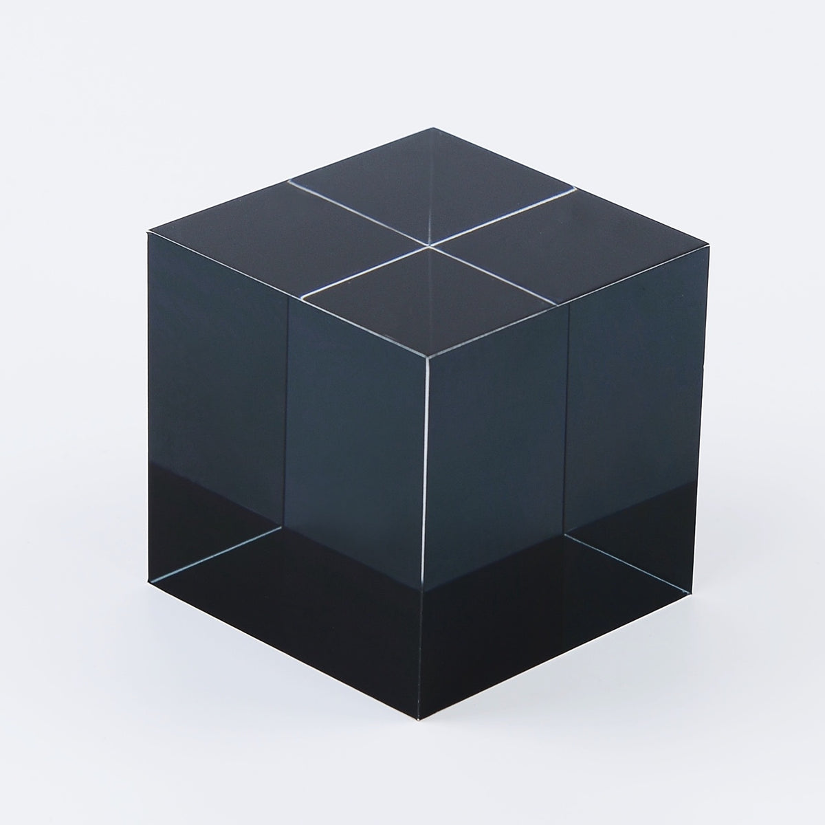 Monochrome Pack cubes stacked together, light passing through