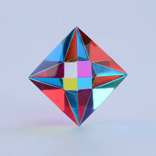 The Aether, a translucent CMY octahedron, in low light where its colours begin to fade to grey