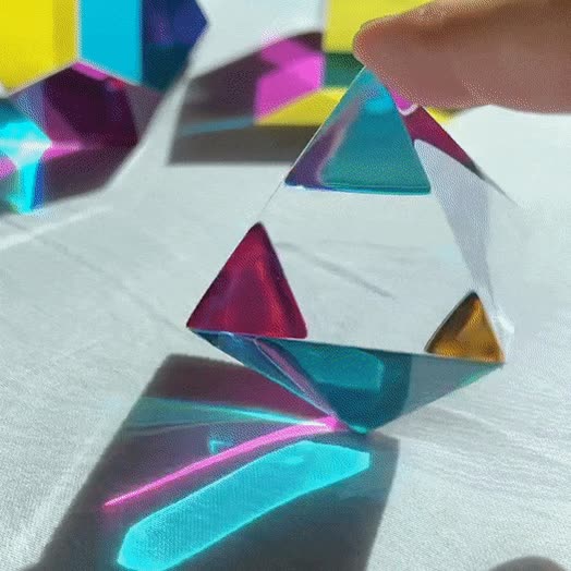 Animated view of The Aether octahedron rotating, translucent colours shifting in the light
